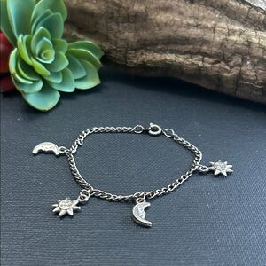 Charming Silver Bracelet with Celestial Charms
